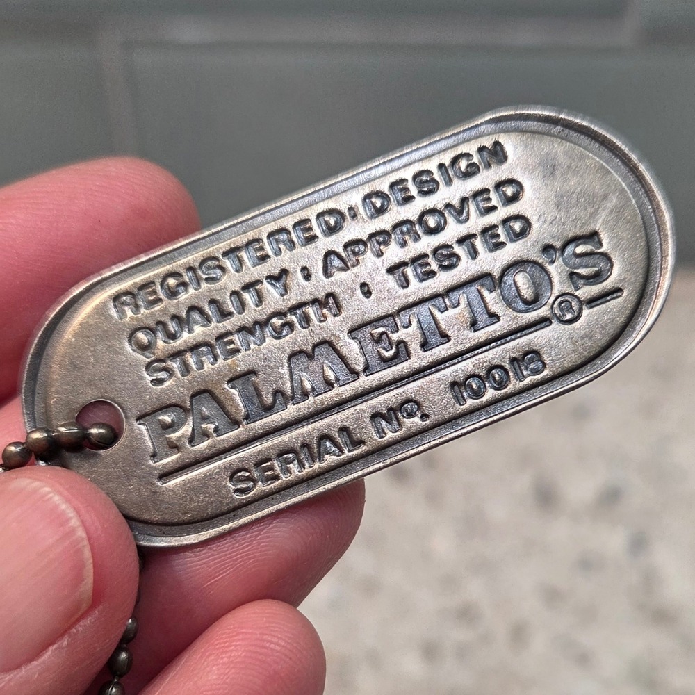 Vintage Palmetto's Metal Dog Tag Keychain Silver Tone Embossed Serial No. 10013